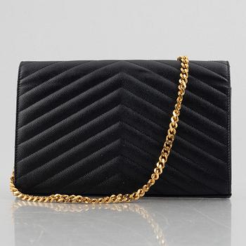 Yves Saint Laurent, a handbag/clutch.