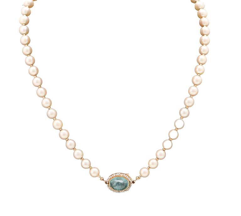 A necklace of cultured pearls, clasp of 18K gold, cabochon cut aquamarine and seed pearls, Atelier Ajour Stockholm 1963.