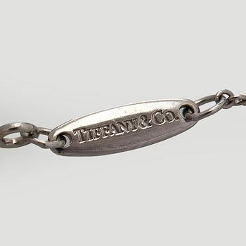 Tiffany & Co, Elsa Peretti, a platinum necklace, "Diamonds by the Yard' with a brilliant-cut diamond.