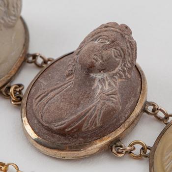 Silver and lava cameo necklace and bracelet.