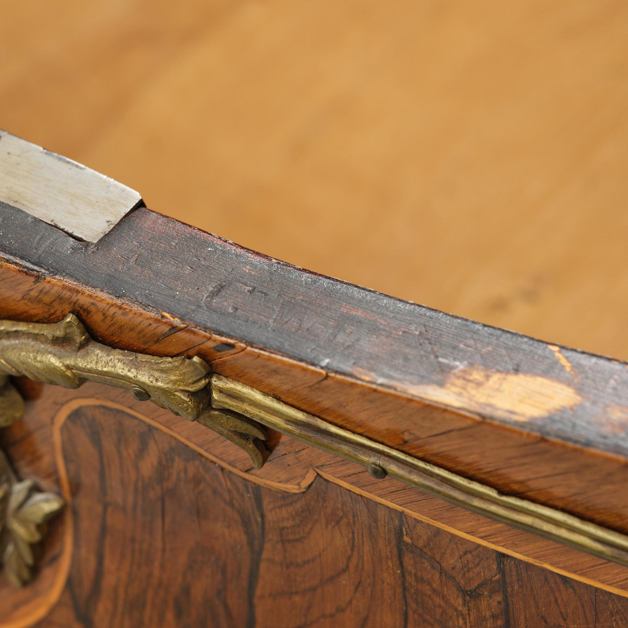 A rococo parquetry commode by C. G. Willkom (master in Stockholm 1763-65).