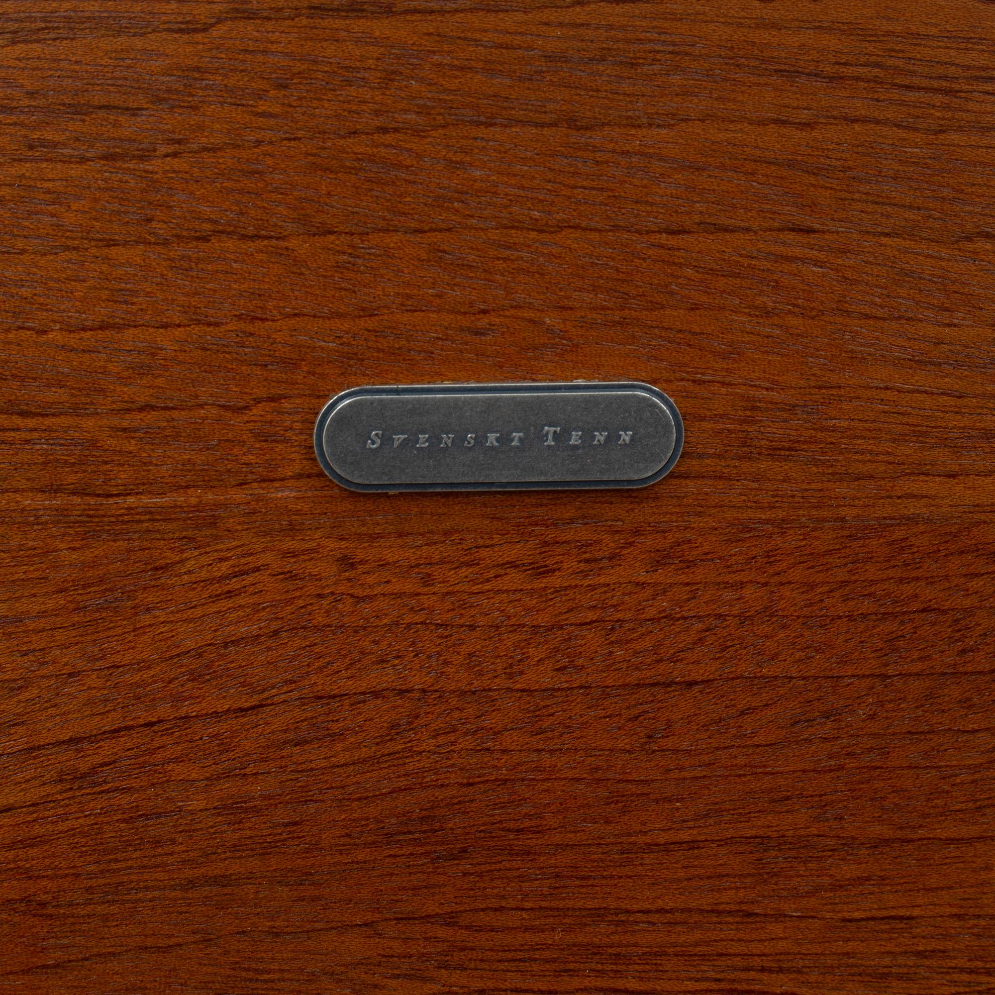 Josef Frank, a model B1058 table, Firma Svenskt Tenn, Sweden, post 1985.