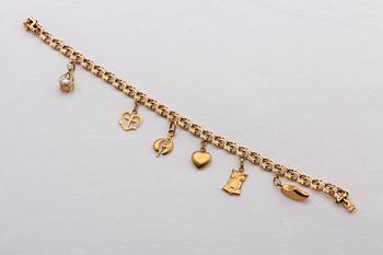 An 18K gold bracelet 1964 total weight ca 15,3 gr.