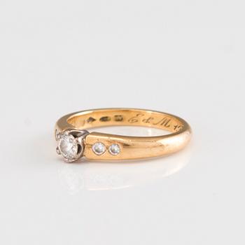 A 18K gold ring with diamonds by Tillander Oy Ab, Turku, Finland 2004.