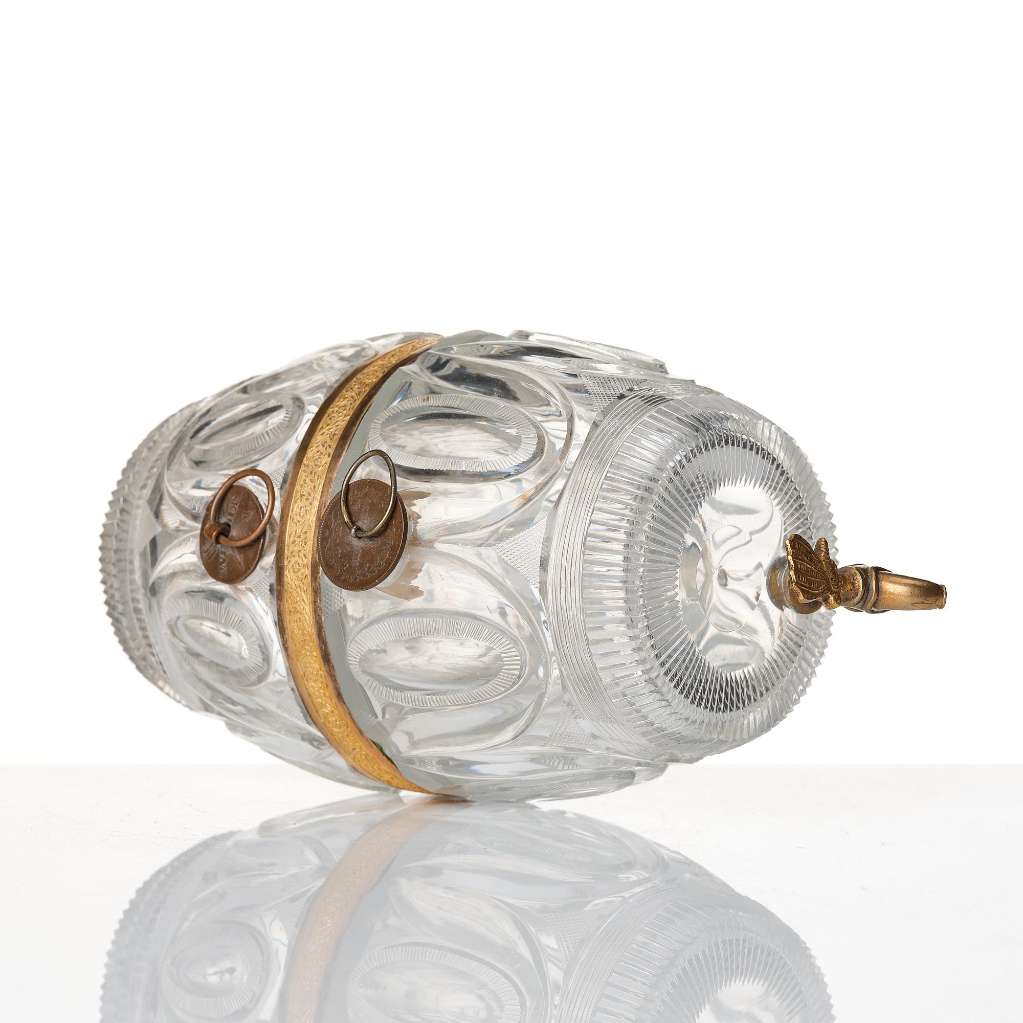 A Empire ormolu-mounted cut glass wine barrel.