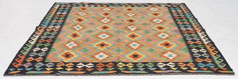 A kilim carpet, ca 251 x 188 cm.