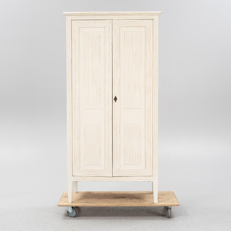 A Gustavian style cabinet, early 20th Century.