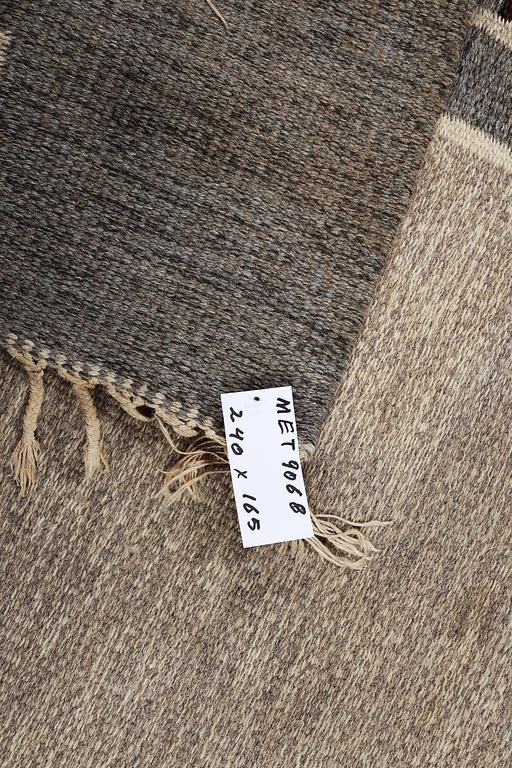 A carpet, flat weave, ca 240 x 165 cm.