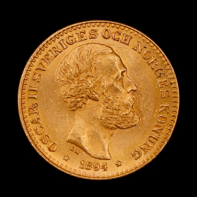 GULDMYNT, 10 kr, Oscar II, 1894. Vikt ca 4 g.