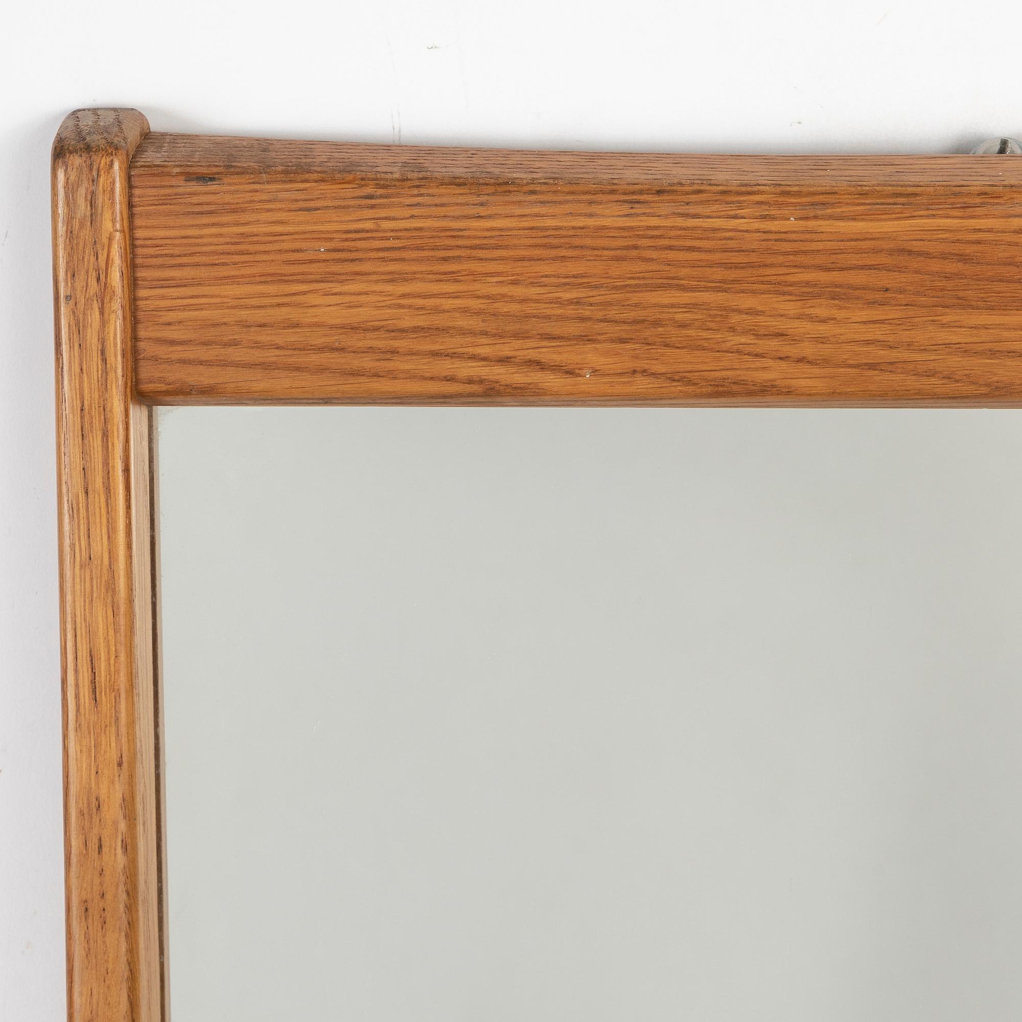 Östen Kristiansson, an oak mirror, Luxus/Vittsjömöbel, Vittsjö.