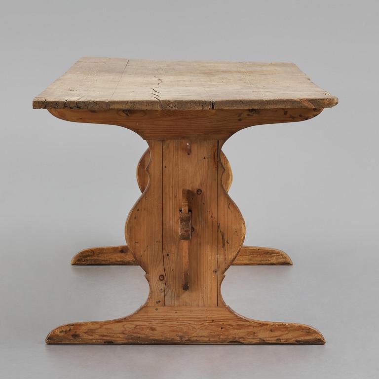 A pine trestle table, 20th century incorporating older elements.