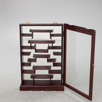 A wall hanged display cabinet, China, 20th century.