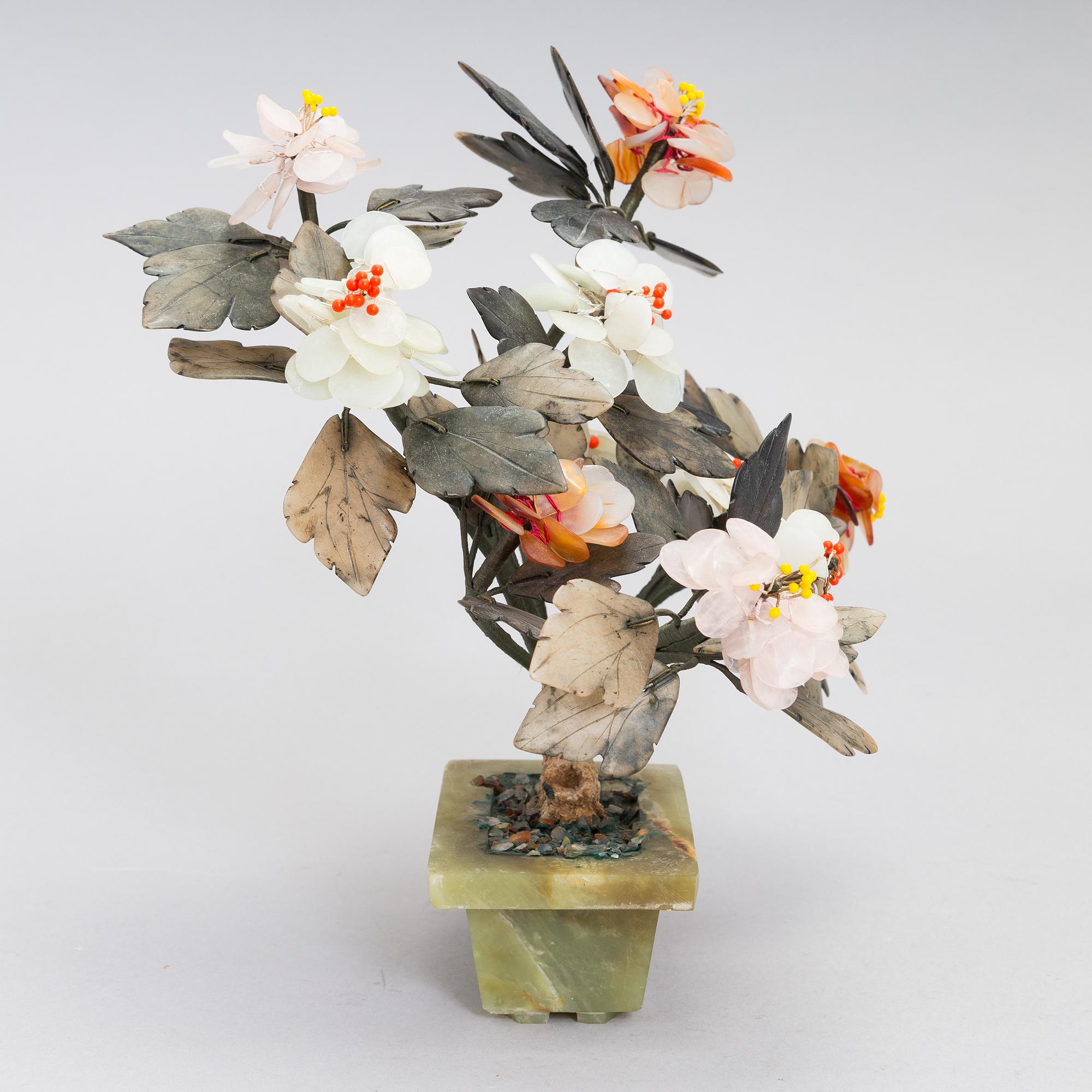 A Chinese table decoration in various stones, latter half of the 20th century.