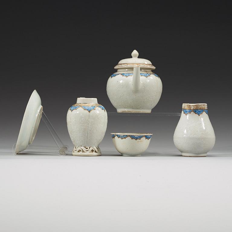 A seven piece underglaze blue, gold and bianco sopra bianco tea service, Qing dynasty, Qianlong (1736-95).