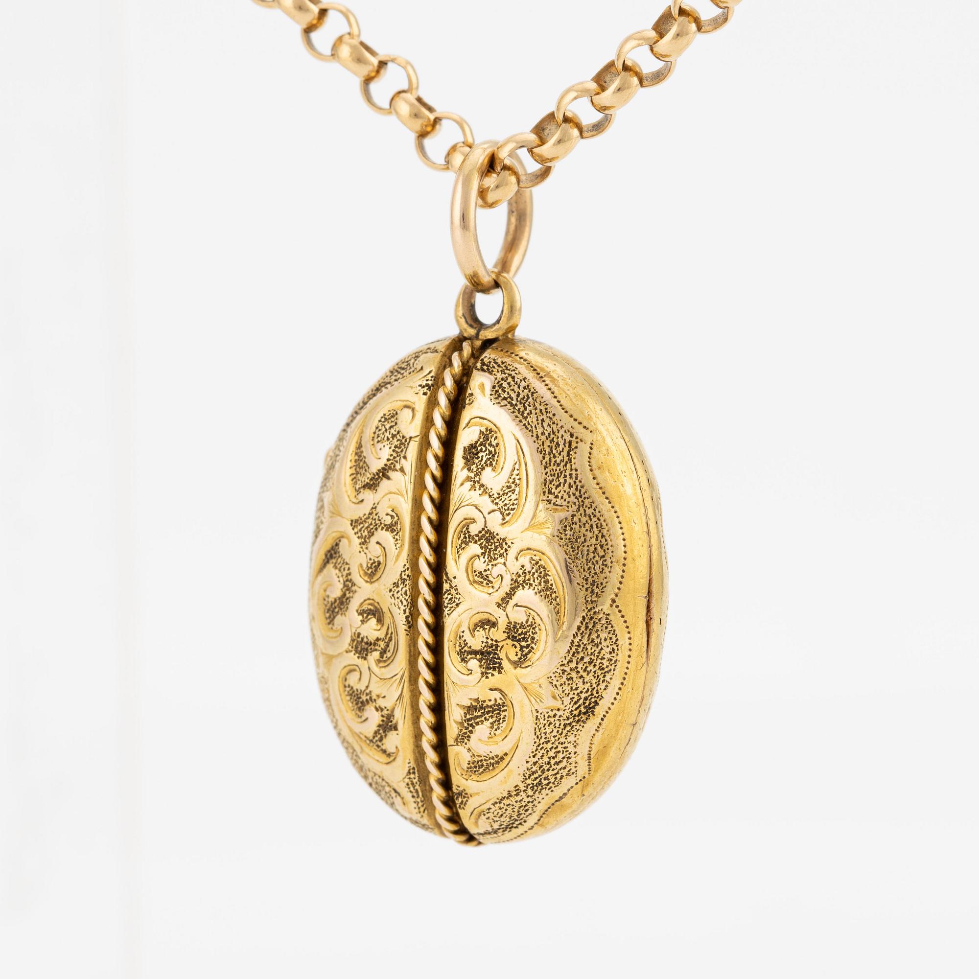 Öppningsbar medaljong med kedja, 18K guld.