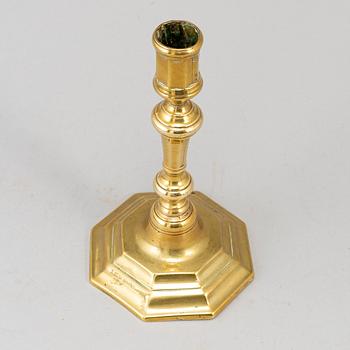 An 18th century bronze candlestick.