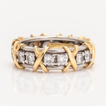 Tiffany & Co, a platinum and 18K gold 'Schlumberger' ring, with brilliant-cut diamonds.