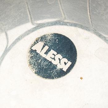 2 pieces of Alessi stainless steel table ware.