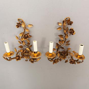A set of four bronzed Rococo-style walls scones mid 1900s.