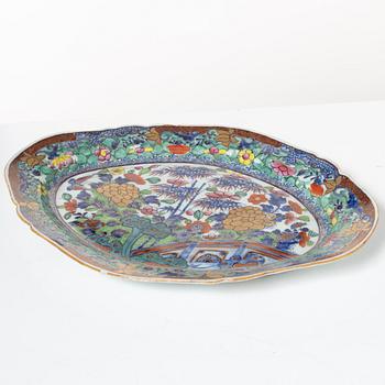 Two Chinese blue and white porcelain dishes and a small dish, Qing dynasty, 18th century.