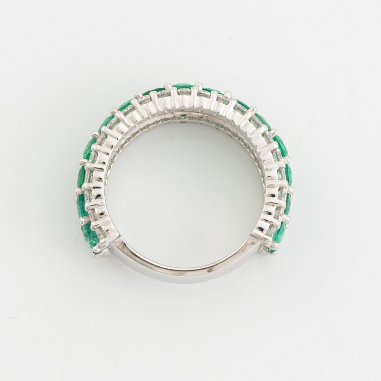 Emerald and brilliant cut diamond ring.