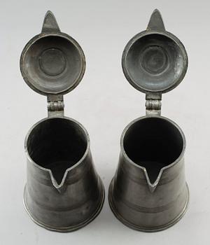 KANNOR, 2 st, tenn, otydliga stämplar, 1800-tal.