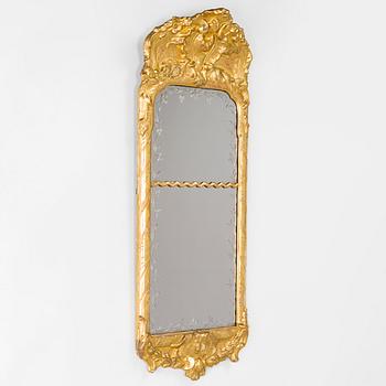 A Swedish rococo mirror, 18th century.