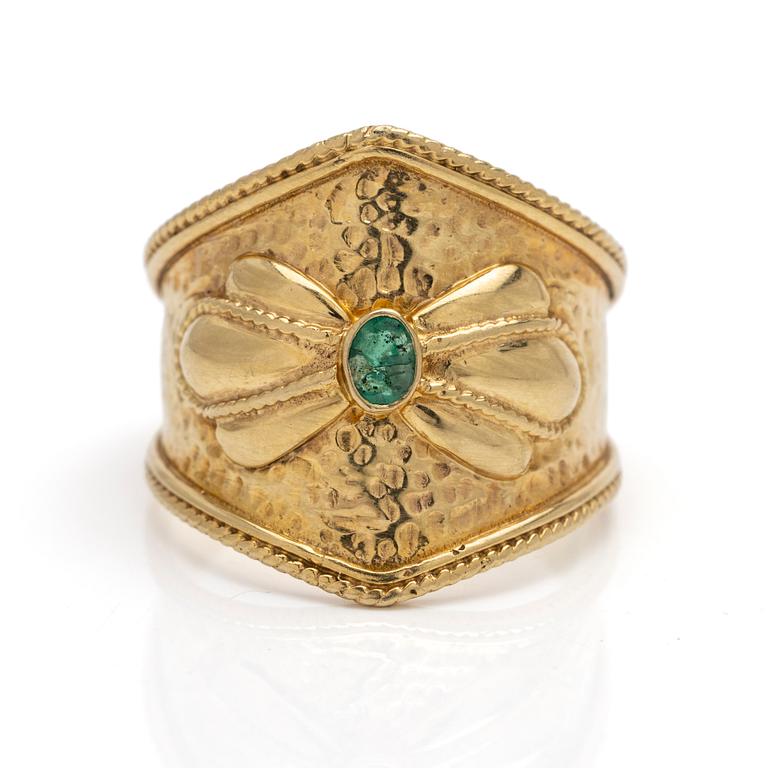 14K gold ring with an emerald.