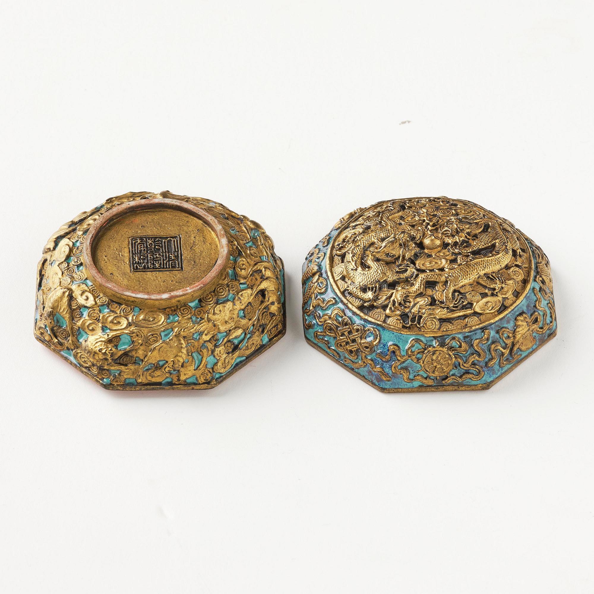 A bronze imitating seal paste box with cover, Qing dynasty, with Qianlong mark.