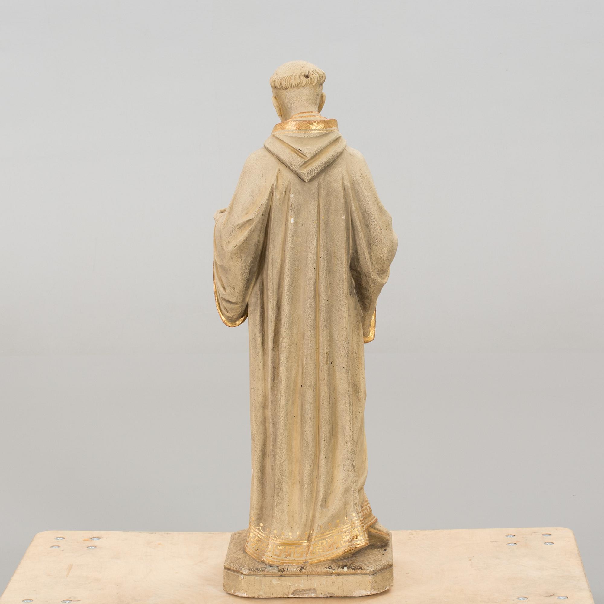 A Dutch concrete sculpture marked J van den Broeck Antwerpen 1907.