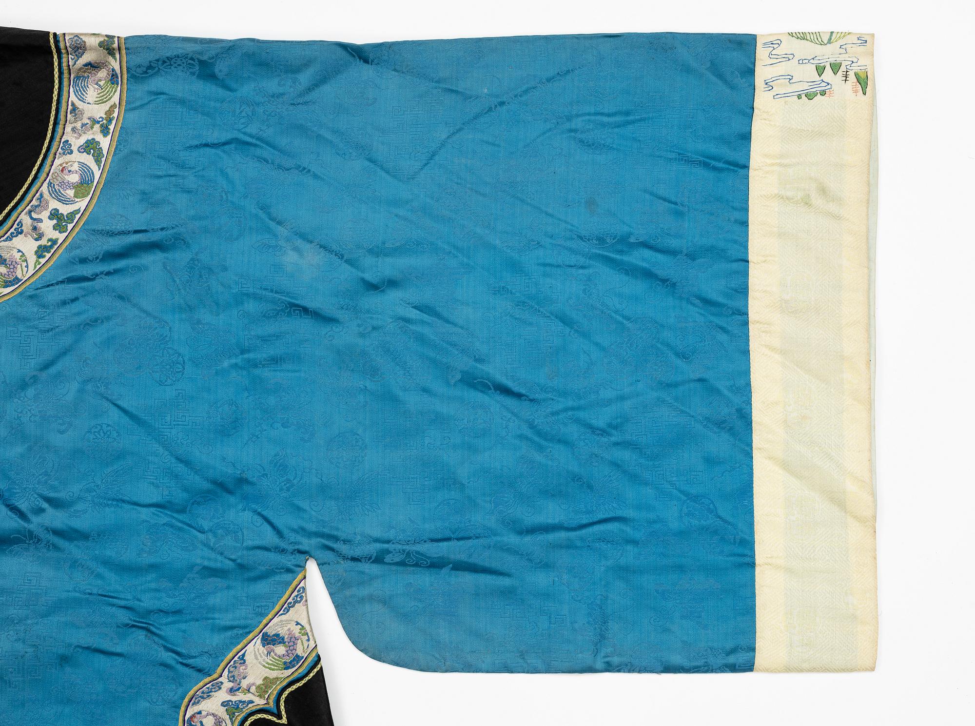 A female silk robe/over coat for winter, Qing dynasty, 19th century.