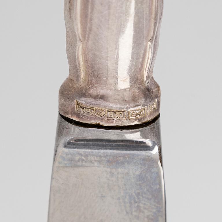 An 56-piece set of 'Chippendale' silver cutlery, Finnish hallmarks.