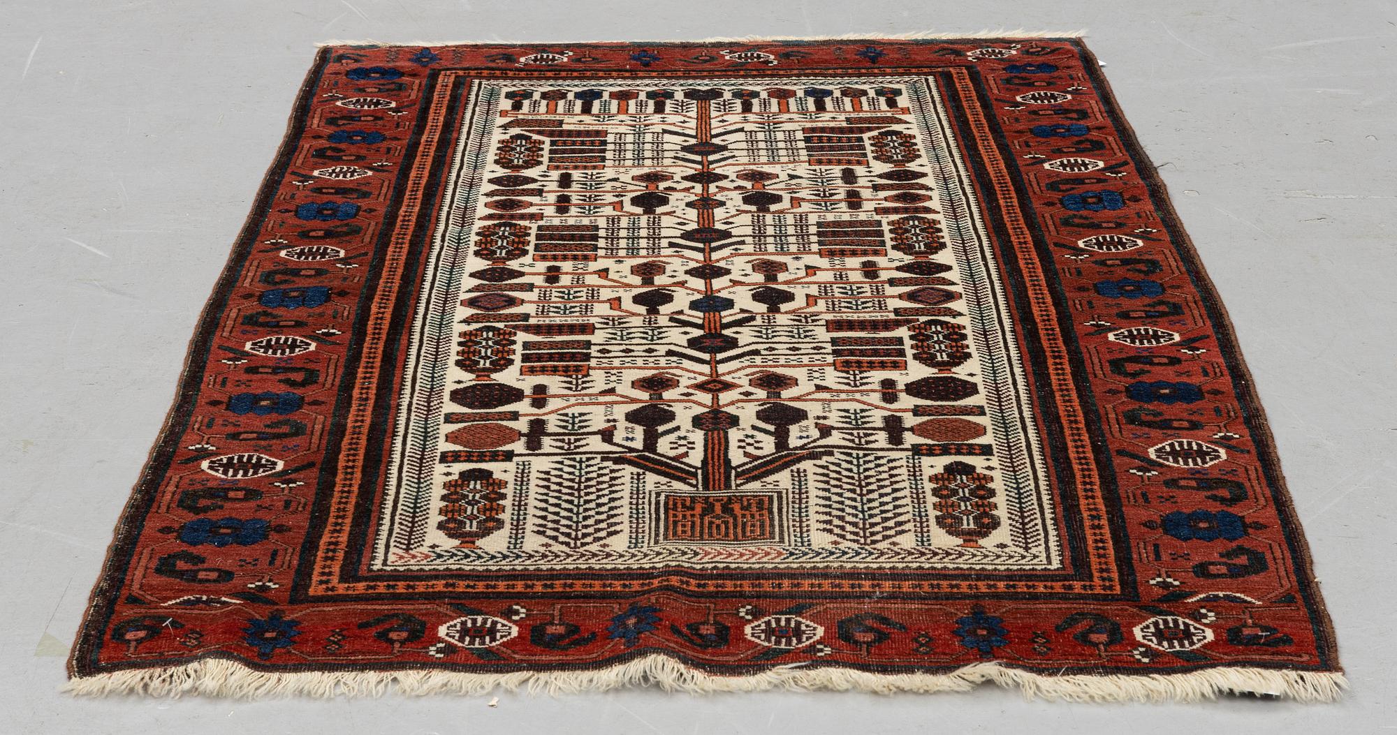A rug, antique Baluch, ca 171 x 102-107 cm.