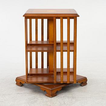 A revolving bookcase, late 20th century.