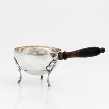 A silver pan with handle, central Europe, 18th century.