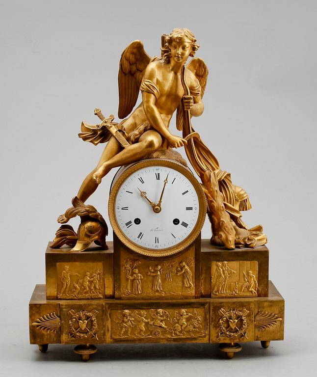 A French Empire early 19th century gilt bronze mantel clock.