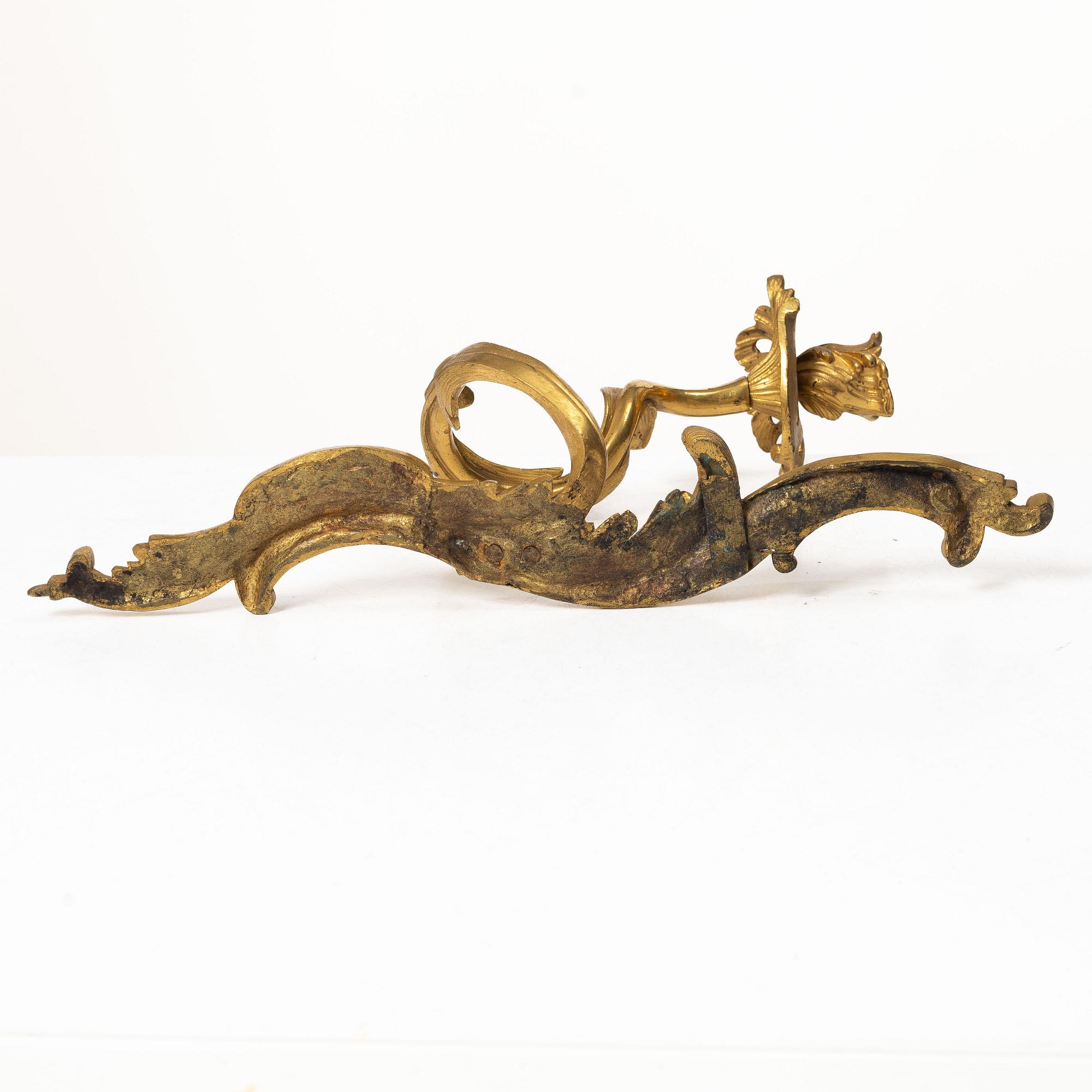 A pair of Rococo-style appliques, France, circa 1900.