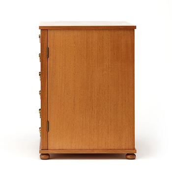 Josef Frank, a mahogany miniature chest of drawers, Svenskt Tenn,  model 2058.