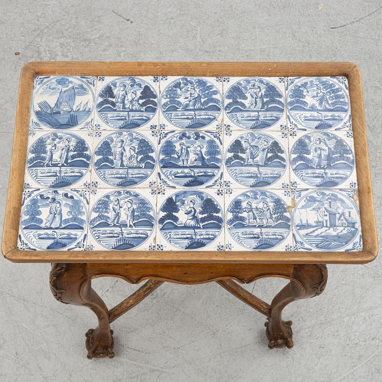 A late Baroque walnut tile-top table, first part 18th century.