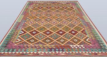 A Kilim rug, approx. 293 x 206 cm.