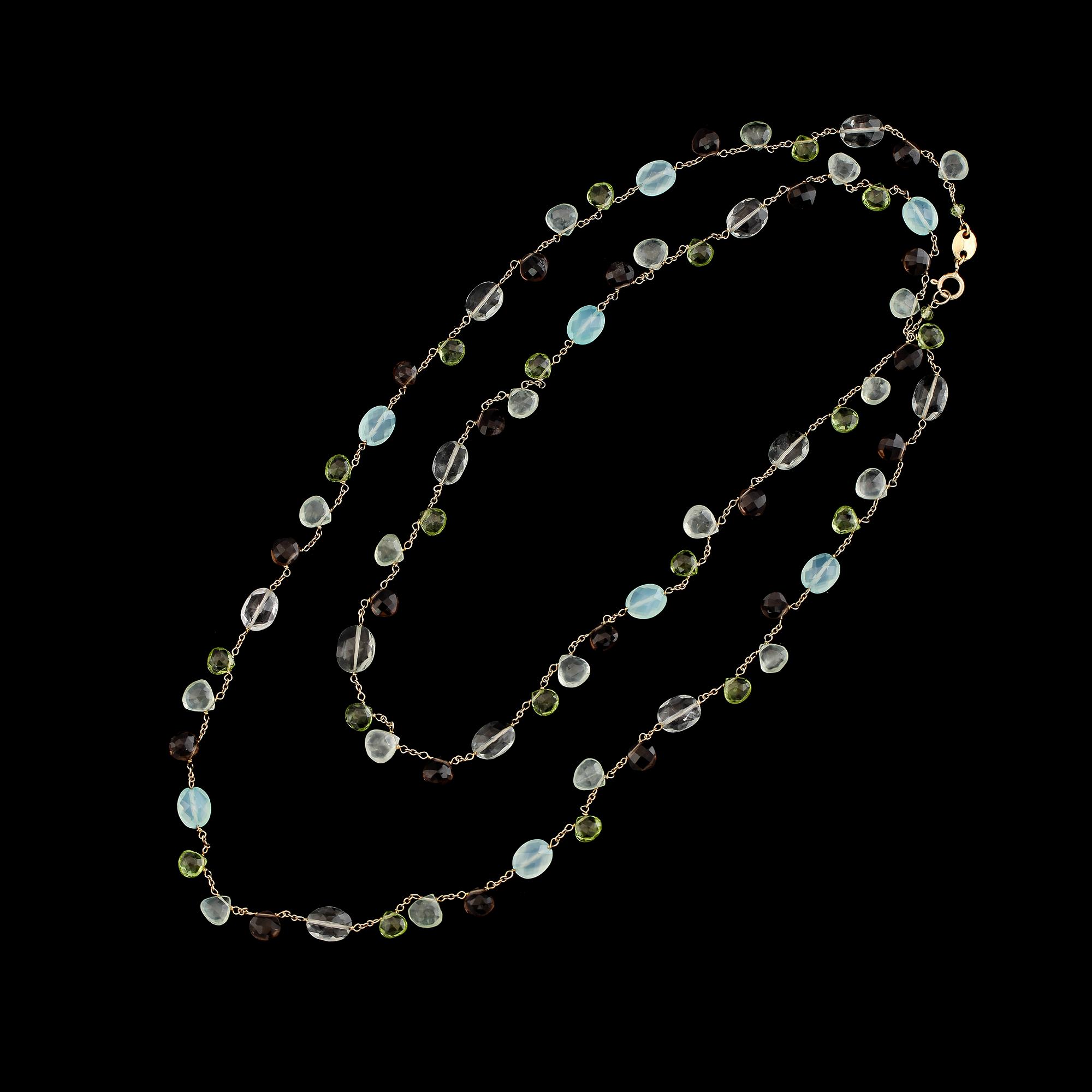 COLLIER, 14K guld och förgyllt silver, röktopaser och peridoter.