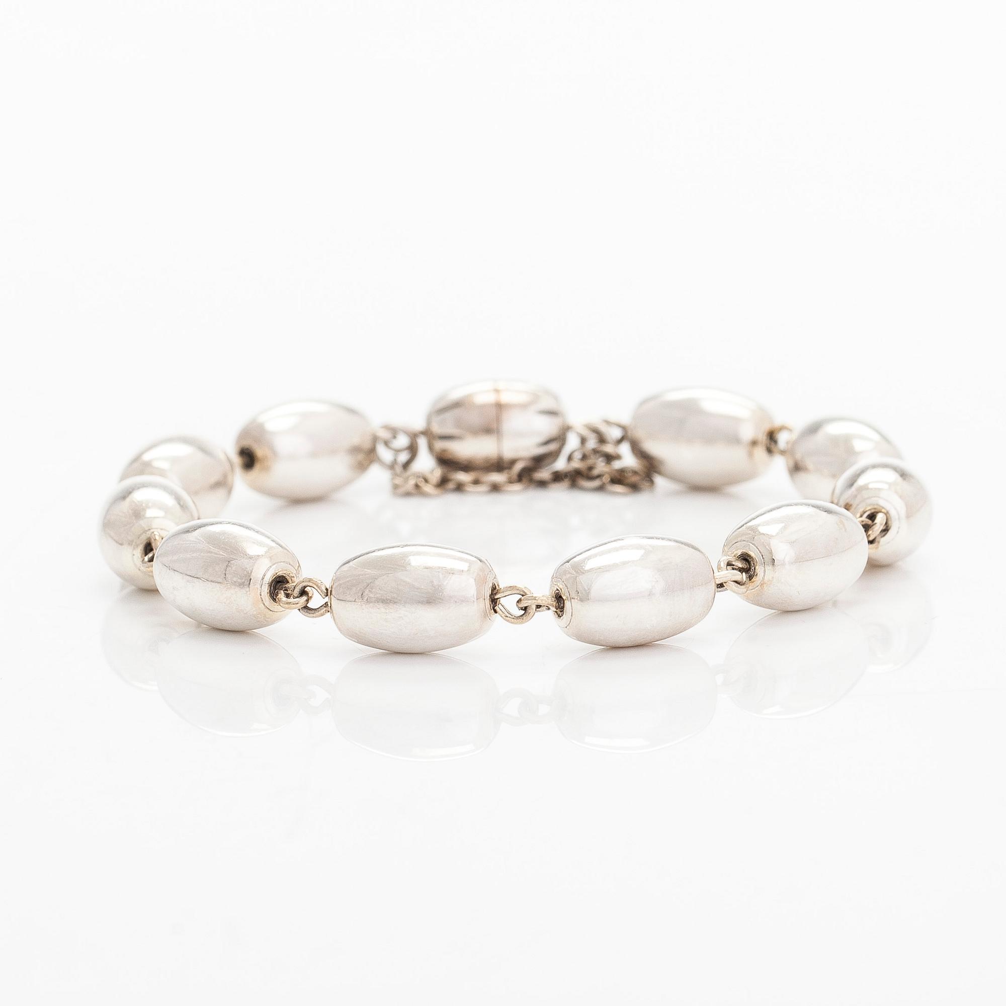 Bracelet, "The Treasure from Halikko", silver, Kalevala Koru, Helsinki 2003.