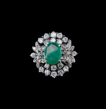 A RING, 8/8 and 16/16 cut diamonds c. 1.50 ct. Emerald c. 2.69 ct. Weight 10 g. Gemmological certificate.