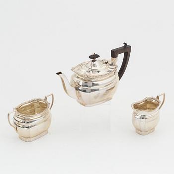 A three piece silver tea service, London 1918.