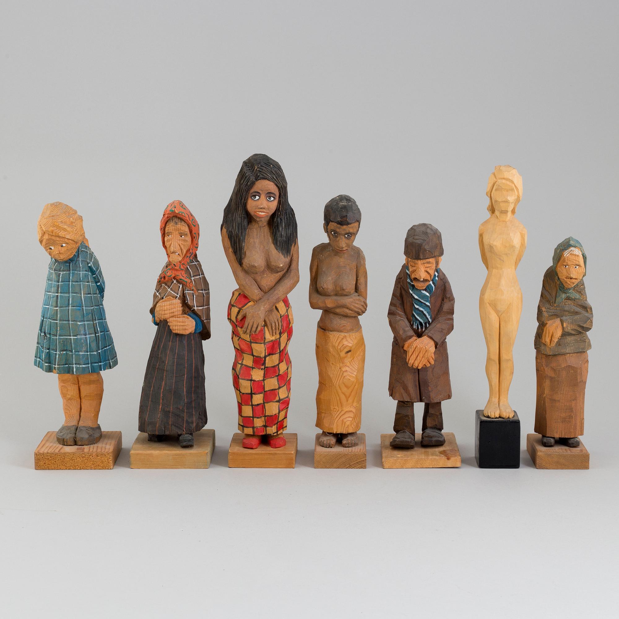 TRÄFIGURER, 7 st, signerade EK. Flertalet daterade 1969. (1 skulptur ej signerad).