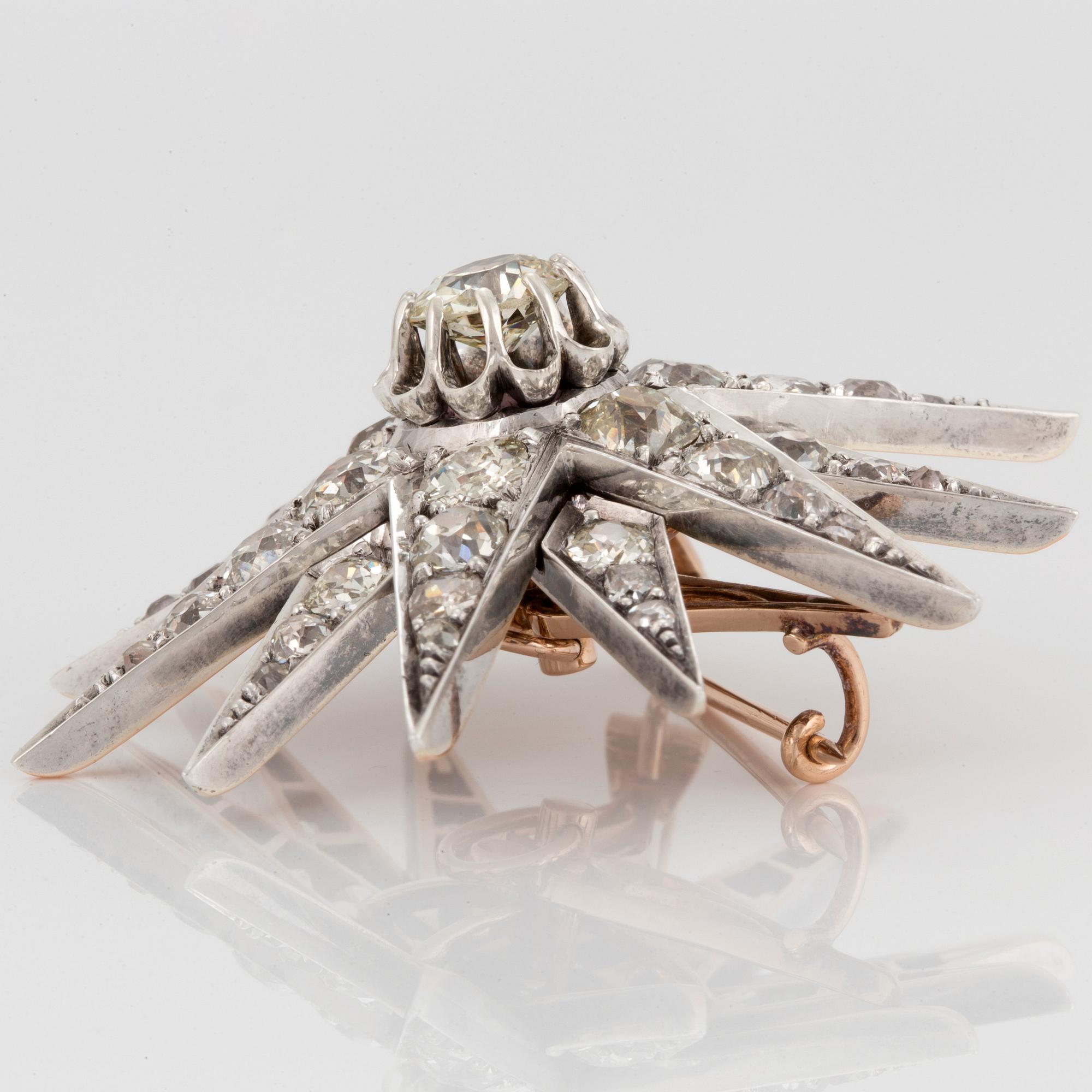 A star brooch set with old-cut diamonds.