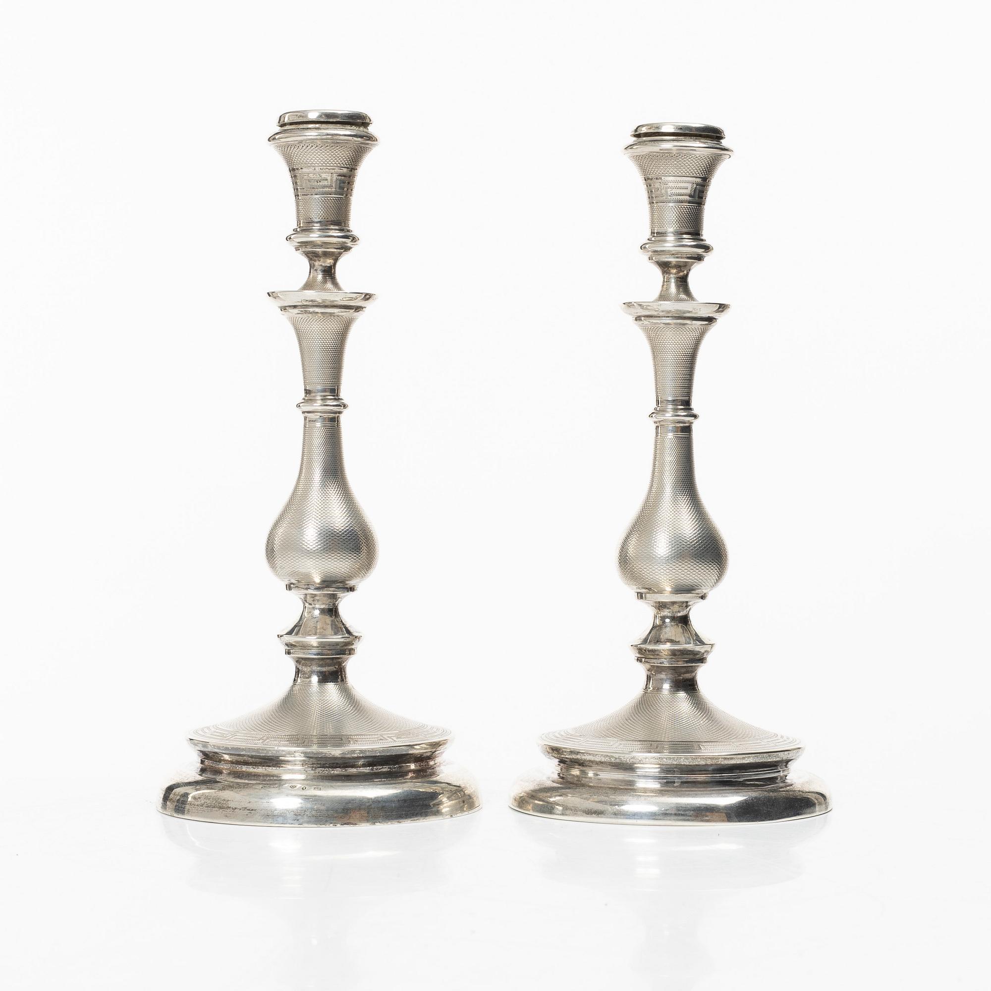 A pair of Swedish silver candelsticks, mark of Lars Larsson & Co,  Stockholm 1872.