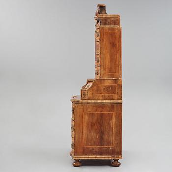 A South German late Baroque walnut and burr-walnut writing cabinet, first part of the 18th century.