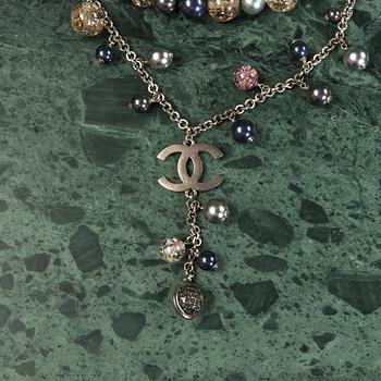 A necklace by Chanel.