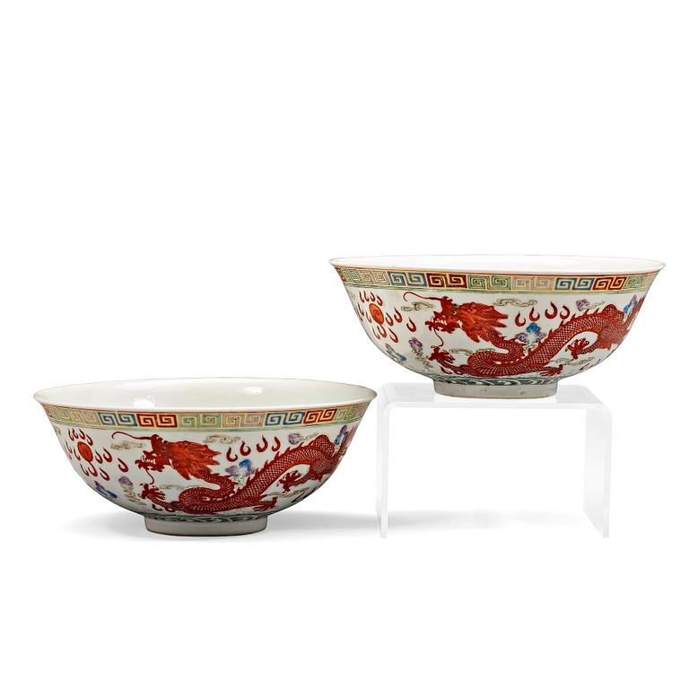 A pair of dragon and phoenix bowls, China, Republic with Qianlong mark.